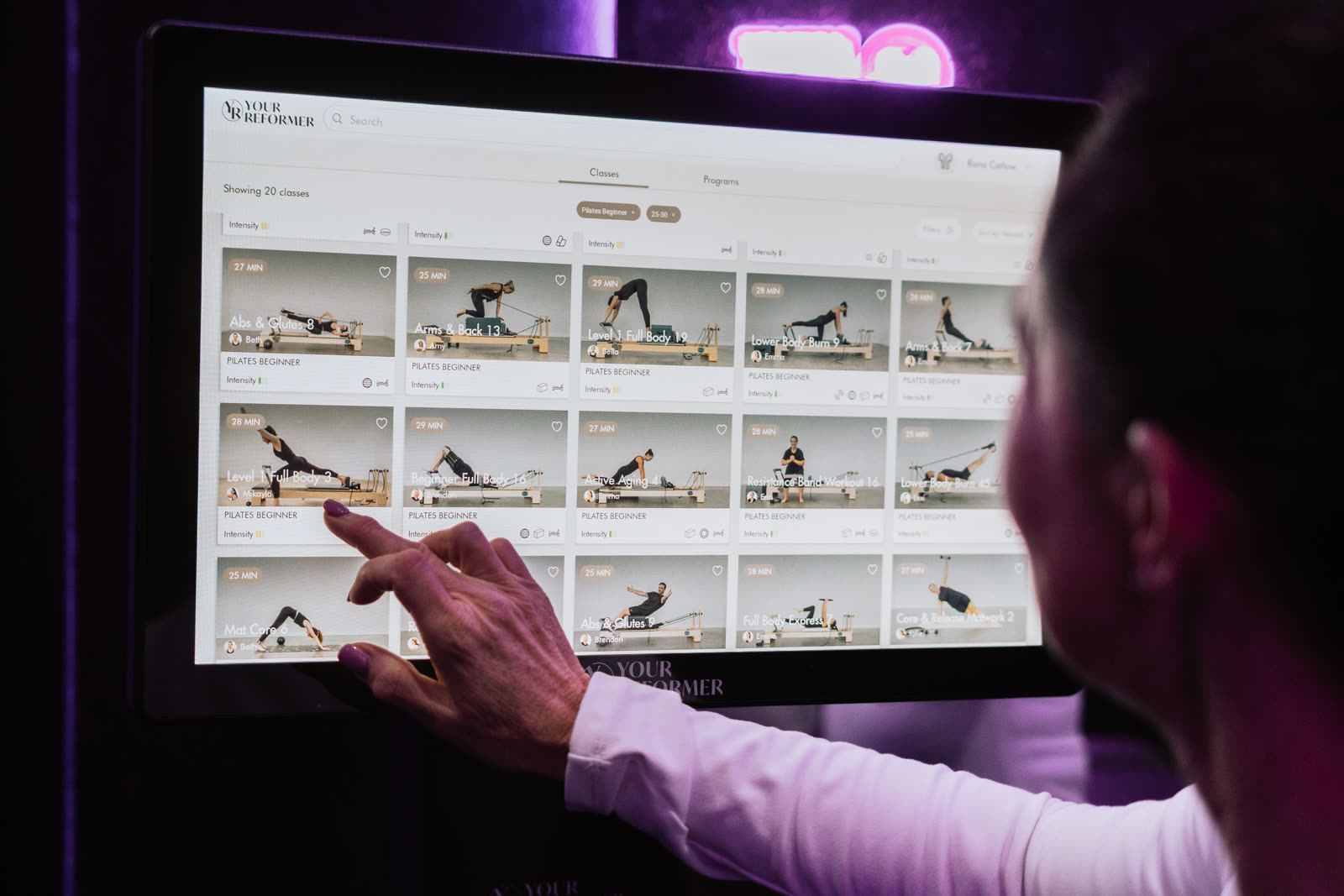 Self-guided class kiosk in the reformer pilates studio