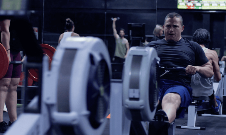 A man on a rowing machine